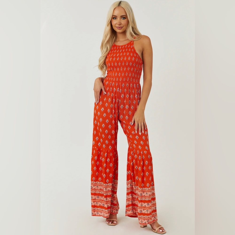 Angie Vivid Fire Floral Print Smocked Flare Jumpsuit